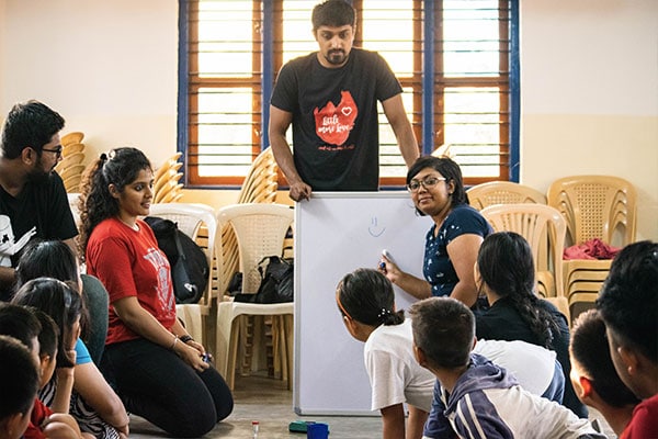 playing pictionary with the children at this home in Bangalore