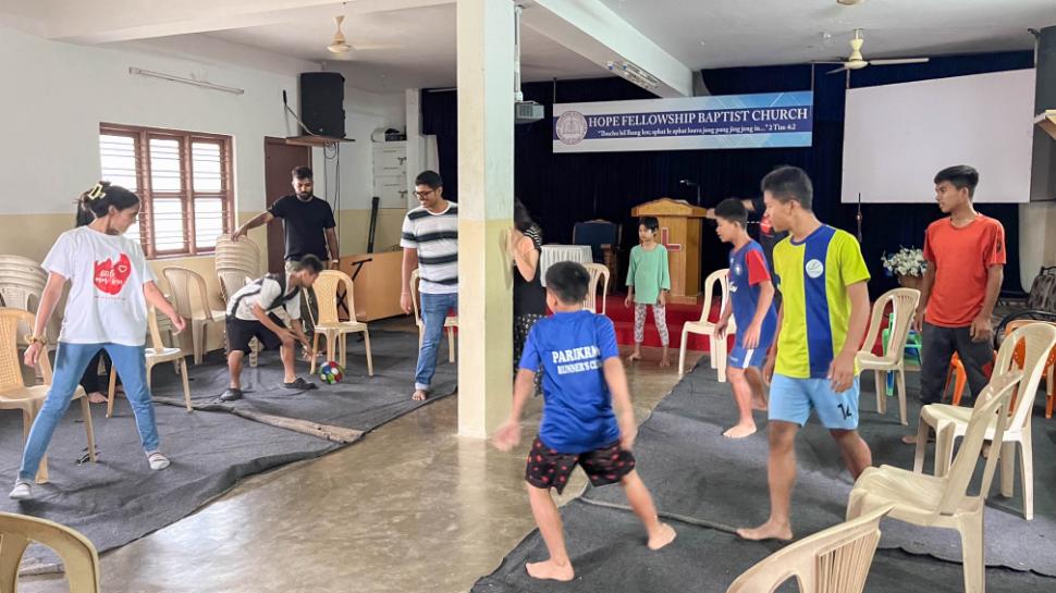 LML volunteers playing dodge ball with children from Lions Hope Home